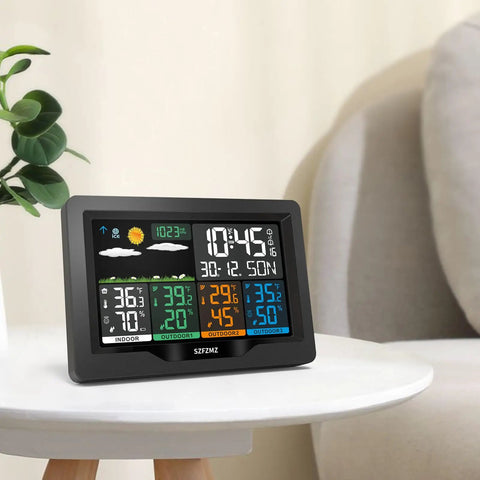 Wireless Weather Station With Indoor And Outdoor Sensors and 7 Inch Color Display showing temperature and humidity.