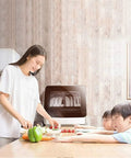 Freestanding Countertop Dishwasher With Auto Dry Storage And Snappy Touch Controls For Rapid Cleaning Cycles high Temp Sterilization And Smart Power Savings in a kitchen with a woman preparing food.