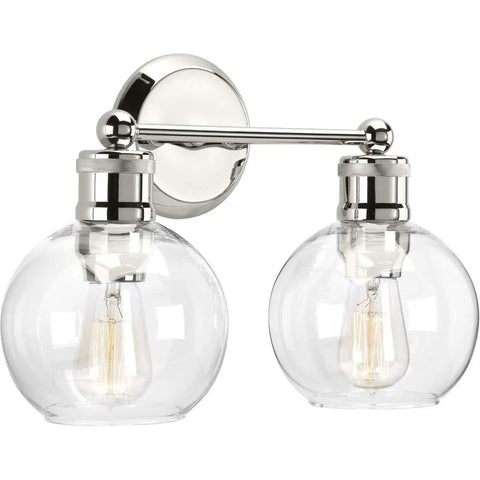Coastal Vibe 2 Light Bath Vanity Light With Clear Glass Globes In Polished Nickel Finish Urban Industrial Style For Bathroom Remodels
