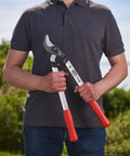 Person holding Swiss Made 20 Inch Loppers for Gardening with Lightweight Aluminum Handles and Carbon Steel Blades
