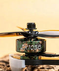 ZX1056 motor on RC drone with propellers, camouflage design, side view, 4mm shaft