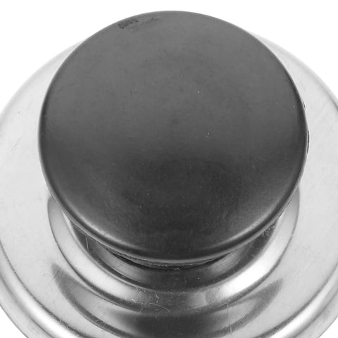 Upgrade Your Kitchen Game With This Stainless Steel Whistling Kettle Lid Knob Replacement Kit That Boils Over Spills Stop Loud And Is Super Easy To Install For Pros Or Home Use black round lid knob on stainless steel kettle lid close-up