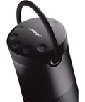 Revolve Plus II Portable Bluetooth Speaker With 360 Degree Sound And Built In Microphone Water Resistant Wireless Speaker With Up To 17 Hours Battery Life And Handy Carry Handle For Outdoors And Backyard Hangouts On The Go close-up view showing top controls and carry handle.