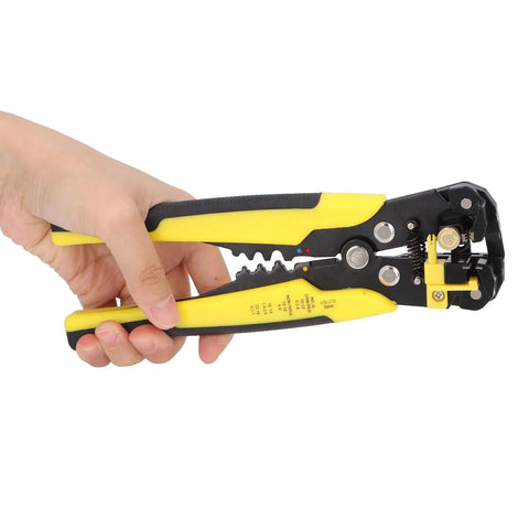 Jauarta 5-In-1 Automatic Wire Stripper Tool for Electricians Heavy Duty Crimper Cutter And Peeler Pliers held in hand with yellow design.