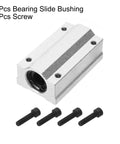 Aluminum SCS12LUU linear bearing slide block, angled front view with round bore and four mounting holes; includes four screws.