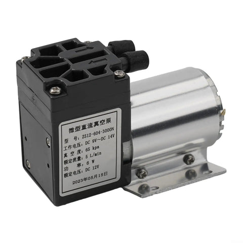 Tough As Nails DC 12V Vacuum Pump Delivering Next Level Suction And Whisper Quiet Negative Air Suction Operation For Smooth Gas Sampling And Hassle Free Workflow, compact black and silver design.
