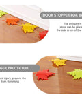 Maple Leaf Door Wedge Stops Four Pack For Slam Free Doors And Floor Protection Made From Sturdy PP Material shown on floor