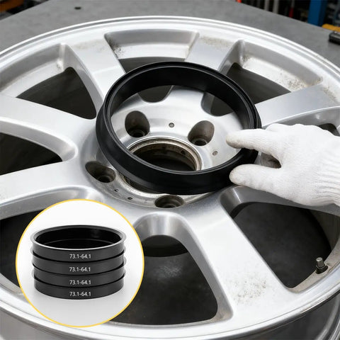 Premium Slick Car Wheel Hub Center Rings 4 Pack Adapts 73.1Mm Outer To 64.1Mm Inner Bore placed on a silver alloy wheel.
