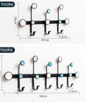 Sturdy Rust Resistant Metal Coat Rack Wall Hooks With Lowkey Luxe Gold Finishing Keeps Your Mudroom Going Strong And Straight Up Neat For Jackets Beanies Keys Backpacks And Sweaters, 3 and 5 hook options with decorative ends.