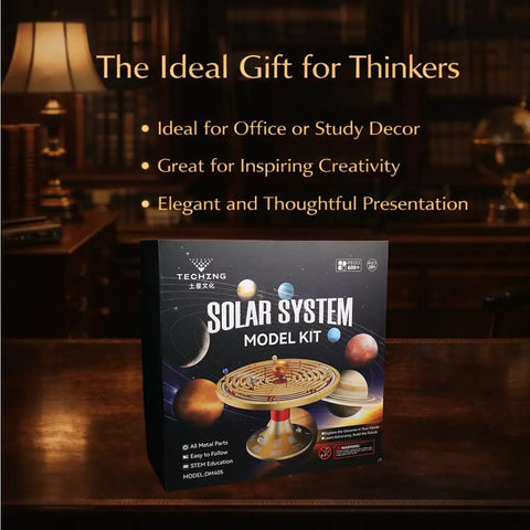 Box of Premium Metal Solar System Model Kit With 600 Plus Precision Parts, Hands-On Mechanical Orrery With LED Sun displayed on desk