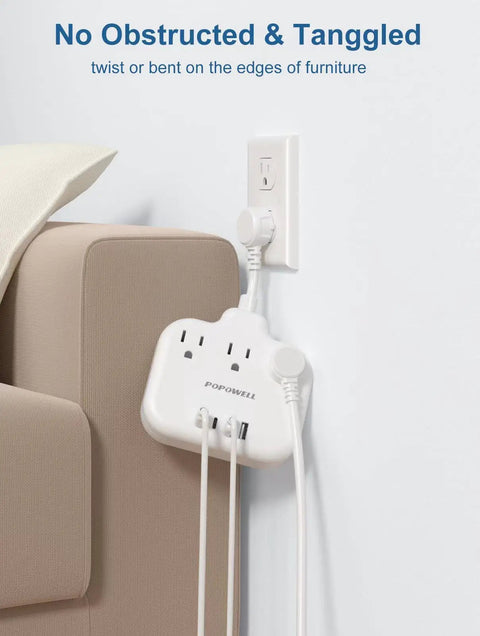 Your Go To USB Power Strip With Three AC Outlets And Four USB Ports Including Two Type C For Cruise Home Dorm And Office Keeps Devices Charged And Desk Clutter Free shown mounted beside a sofa, plugged into wall.