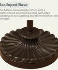 Detail of scalloped base of Bronze Floor Lamp With Glass Alabaster Swirl Amber Shade, showcasing intricate design and bronze finish.