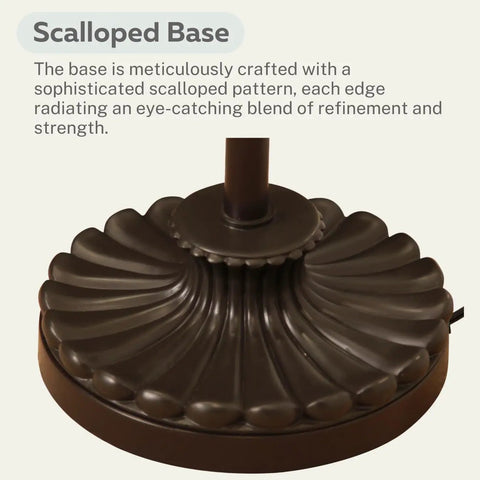 Detail of scalloped base of Bronze Floor Lamp With Glass Alabaster Swirl Amber Shade, showcasing intricate design and bronze finish.