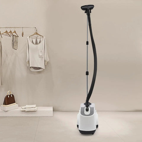 Pro Grade Garment Steamer 110V 1500W With Adjustable Steam Temperature in white, shown in a room with clothes rack and accessories.