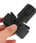 Closeup of 4 Pack Quick Install Childproof Refrigerator Locks in black ABS plastic, shown handheld, for cabinets, safe home, peace of mind.