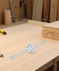 Pro Grade Stainless Steel Angle Ruler And Carpenter Square for woodworking on a wooden workbench