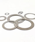 Ultra Thin 0.2mm Stainless Steel Washer Set For M3 To M20, 600 Pcs Flat Plain Shim Gasket Assortment, 304 Grade, Durable, Corrosion Resistant, High Hardness, Ideal For Spacers And Hardware That Gets The Job Done. assorted flat stainless steel washers on white background