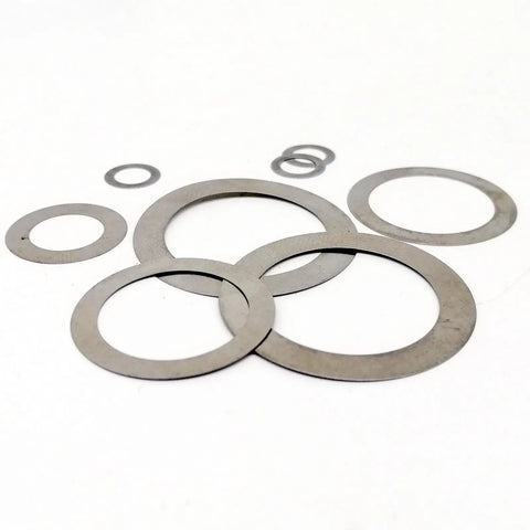 Ultra Thin 0.2mm Stainless Steel Washer Set For M3 To M20, 600 Pcs Flat Plain Shim Gasket Assortment, 304 Grade, Durable, Corrosion Resistant, High Hardness, Ideal For Spacers And Hardware That Gets The Job Done. assorted flat stainless steel washers on white background