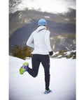 Person running on snow wearing Ice Traction Cleats For Running Shoes, Lightweight Grip With Full Sole Coverage, Grey Green, X Large