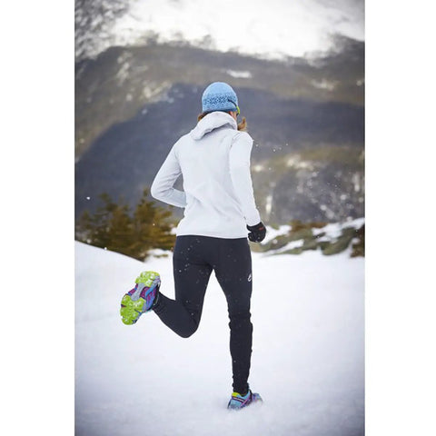 Person running on snow wearing Ice Traction Cleats For Running Shoes, Lightweight Grip With Full Sole Coverage, Grey Green, X Large
