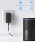 12V 2A Power Adapter For LED Strips And Small Electronics AC To DC Wall Plug installed powering a smart speaker.