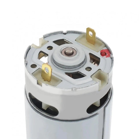 Top view of RS550 18V DC Geared Micro Motor Featuring 14 Tooth Spur Gear With Nine Point Five Millimeter Shaft and terminals.