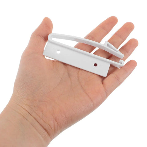 5 Pack Invisible Childproof Drawer Locks For Cabinets And Furniture held in a hand, showing size and adhesive feature.