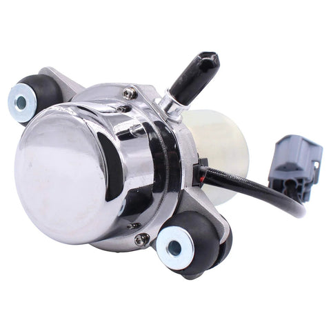 Electric brake booster vacuum pump with chrome housing, black electrical connector, and rubber mounting bushings.