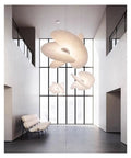 Silk Pendant Light for Living Room Restaurant Shop, elegant off-white design, hanging above modern seating area.