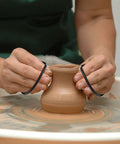 Clay wire cutters with black handles and steel wire; used to cut clay on a pottery wheel; 2-piece set.