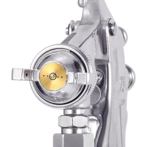 Close-up of Pro Level Spray Gun With 3.0mm Stainless Steel Nozzle and brass tip detail for precise fluid control.