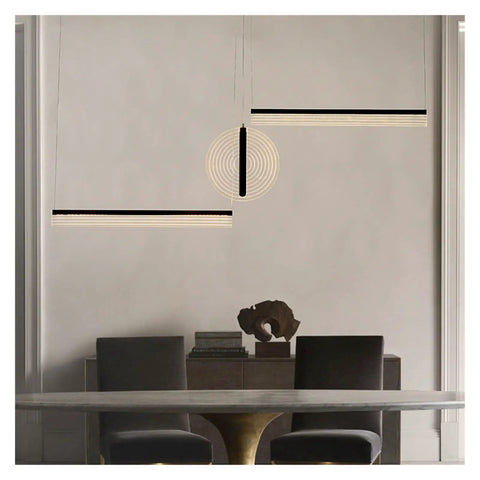 Modern Minimalist Three-Stage Creative Pendant Light Dining Table Indoor Living Room Bar Golden/Black LED Light in a stylish setting.
