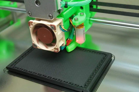 Built Tough Hypercube Evolution 3D Printer Metal Frame Kit With 300X300X300MM Square Build Volume And Complete Black Aluminum Extrusion Hardware Bundle For Kick Ass Smooth Prints close-up view of 3D printer nozzle and fan.