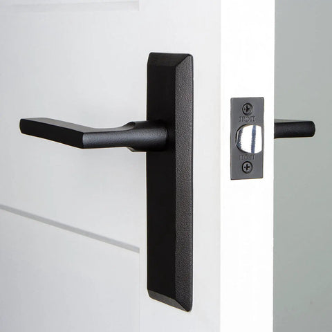 Keep Plate With Dirk Lever In Black Iron For Modern Doors, Matte Black Hardware Set With Clean Lines on White Door