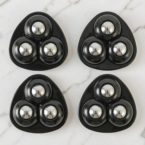 Mini Caster Wheels 12pcs 360 Degree Swivel Adhesive for Furniture, black plastic base with metal ball wheels, four pieces arranged.