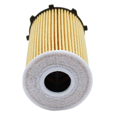 Close-up of a paper-engine oil filter for Four Piece Engine Oil Filter Kit That Fits Kia Sedona 2011 Through 2018.
