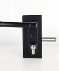 Heavy Duty Stainless Steel Gate Latch Deadlock Adjustable Bolt Security Lock Fits 40 To 60 Millimeter Frames Includes Strike Plate Three Keys And No Sweat Mounting, side view with handle and keyhole.