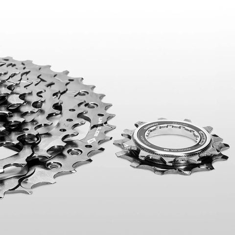 Cues CS LG400 10 Speed Cassette 11 To 43 Teeth With Linkglide for smooth shifts and longevity, shown in detail on white.