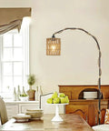 Straight Up Chic Boho Woven Rattan Plug In Pendant Ceiling Light casting dreamy art deco wall shadows in a cozy dining room.