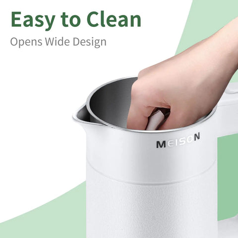 Ultra Compact 0.6L Electric Kettle Travel Ready On The Go Stainless Steel Mini Hot Water Boiler Double Wall Cool Touch Portable Teapot Auto Shut Off Boil Dry Protection 120V 800W White Finish with hand inside for easy cleaning.