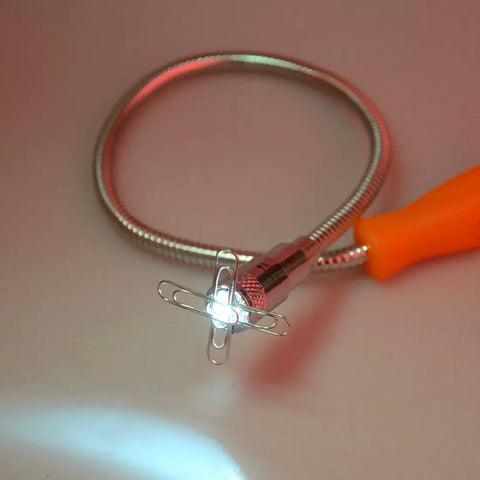 24 Inch Flexible Magnetic Pickup Tool With LED Light, stainless steel wand, illuminated on white surface