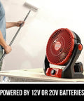 Rock Solid Brushless 7 Inch Jobsite Fan Delivering A Smooth 500 Cfm Breeze With A Flexible 180 Degree Pivoting Head And Quick Adjust Variable Speed Controls For Crew Comfort near a painter, powered by batteries.