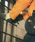 Person using Tie Wire Reel With Quick Lock And Lightweight Aluminum Body, Ambidextrous Rewind Knob, Fits 12 to 18 Gauge Wire