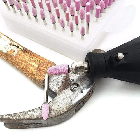 Rotary Tool Grinding Stone Set With One Eighth Inch Shank Aluminum Oxide Bits, 100 Pcs in use on hammer head for sharpening