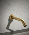 Components Wall-Mount Bath Spout in Vibrant Brushed Moderne Brass, premium metal construction, modern bath update shown installed
