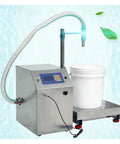 Pro Level Automatic Liquid Filling And Honey Bottling Machine With Zero Sweat Digital Controls And Tough As Nails Diaphragm Pump For Wine Packaging Operations with digital controls and a white bucket underneath.