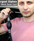 Hand holding High Flow Siphon Pump Handheld Fuel Transfer Kit For Gasoline Diesel Water And Oils Portable Manual Siphon With 2M Hose Easy Start No Spill Siphoning For Cars Boats And More