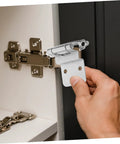 Anneome self-closing inset cabinet hinge; chrome metal with flush-mount mounting plate, 2 hinges visible on cabinet.