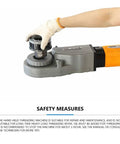 Close-up of Heavy Duty Workhorse 2 Inch Handheld Electric Pipe Expander And Cutter with threaded attachment and glove.
