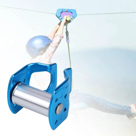 Slackline Pulley For Outdoor Zipline Obstacle Course Portable Aluminum Slider Pulley, shown in action on a zipline.